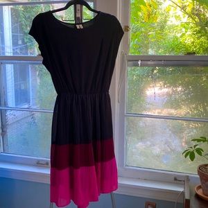 Black & pink knee length dress.